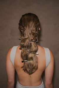 Invisible bead extension rows sectioned during an install at Shade Studio in Long Branch, New Jersey