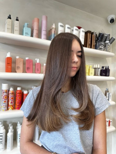 Long straight brunette blow dry finished smooth at Shade Studio in Long Branch, New Jersey