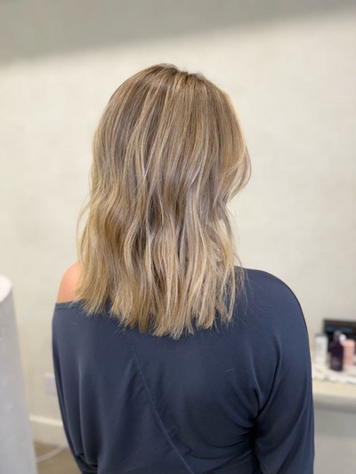 Shoulder length blonde highlights with a lived in finish at Shade Studio in Long Branch, New Jersey