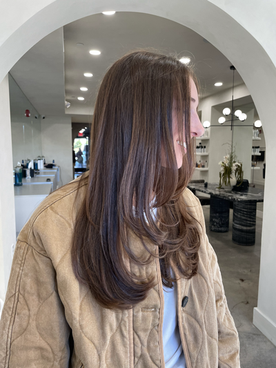 Long wavy balayage with dimension through the mid lengths and ends at Shade Studio in Long Branch, New Jersey